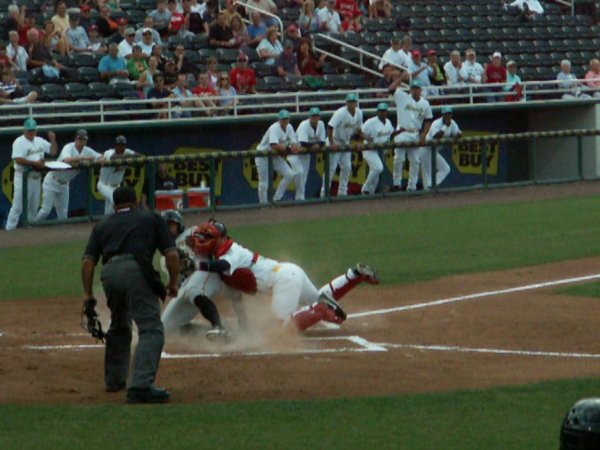 14 Evan Chambers tagged out by Josmil Pinto on throw from Lance Ray  4/14/12 against Bradenton Marauders