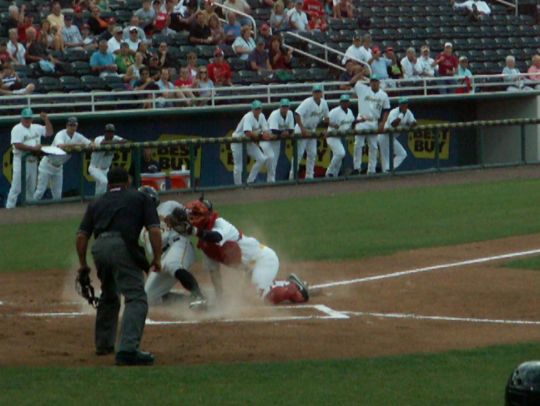 15 Evan Chambers tagged out by Josmil Pinto on throw from Lance Ray  4/14/12 against Bradenton Marauders