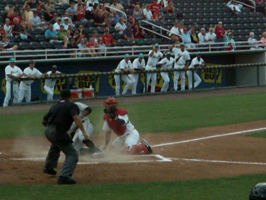 18 Evan Chambers tagged out by Josmil Pinto on throw from Lance Ray  4/14/12 against Bradenton Marauders