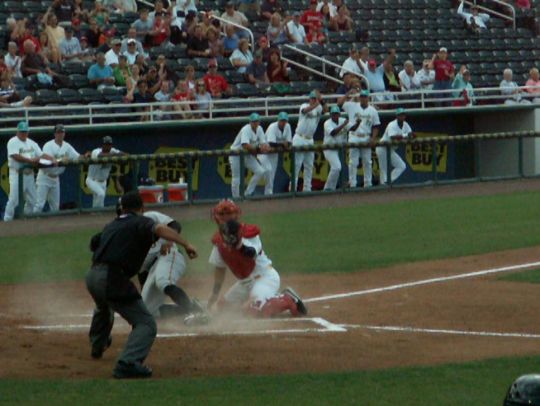 19 Evan Chambers tagged out by Josmil Pinto on throw from Lance Ray  4/14/12 against Bradenton Marauders