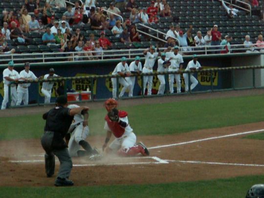 20 Evan Chambers tagged out by Josmil Pinto on throw from Lance Ray  4/14/12 against Bradenton Marauders