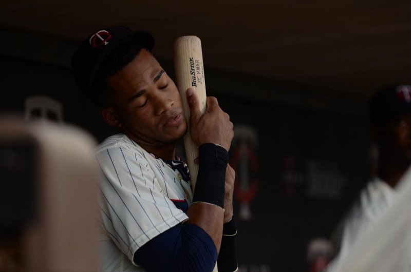 Florimon rubbing Joe Mauer's "Big Stick" all over him.