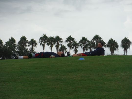 Jason Kanzler and Chad Christensen laying out after their turn