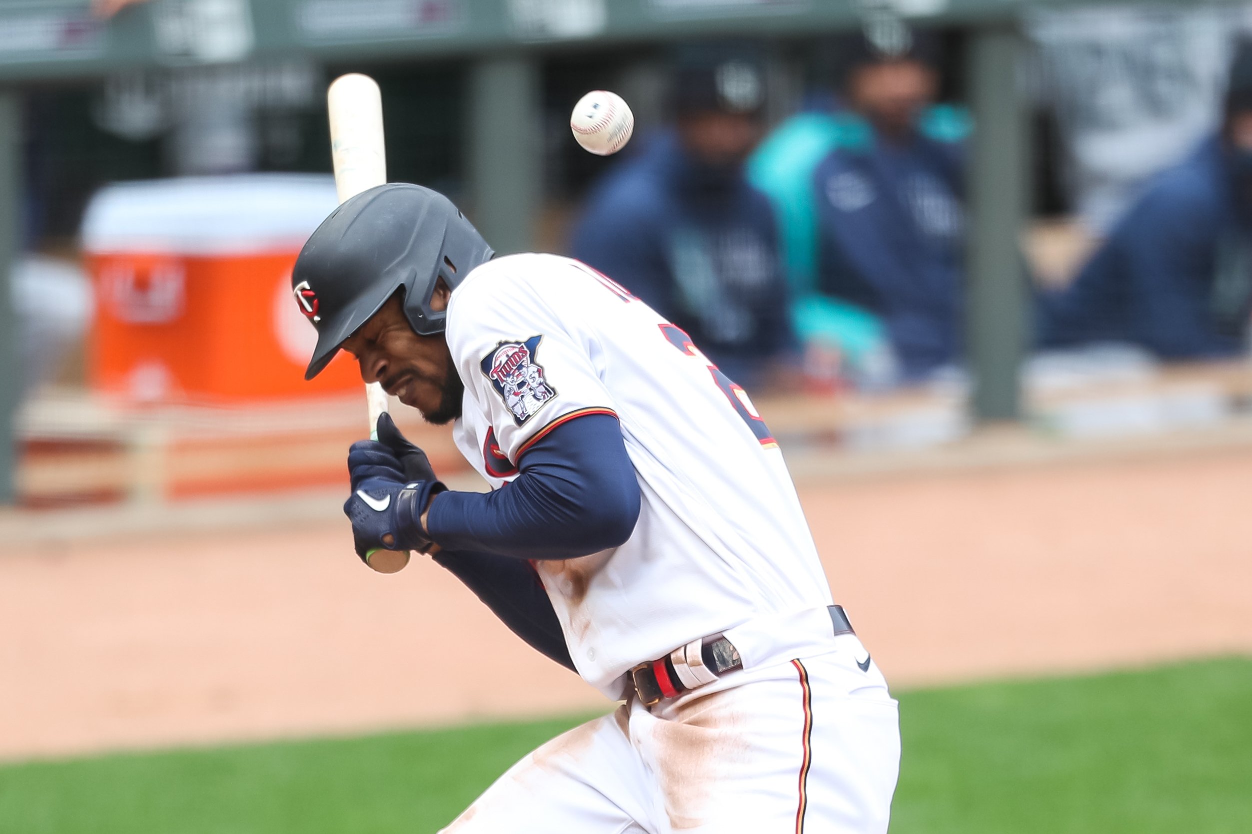 Minnesota Twins third baseman Nick Punto #8 hits a high fly for an out in  the 6th inning of the Twins' baseball game against the Kansas City Royals  at Target Field in