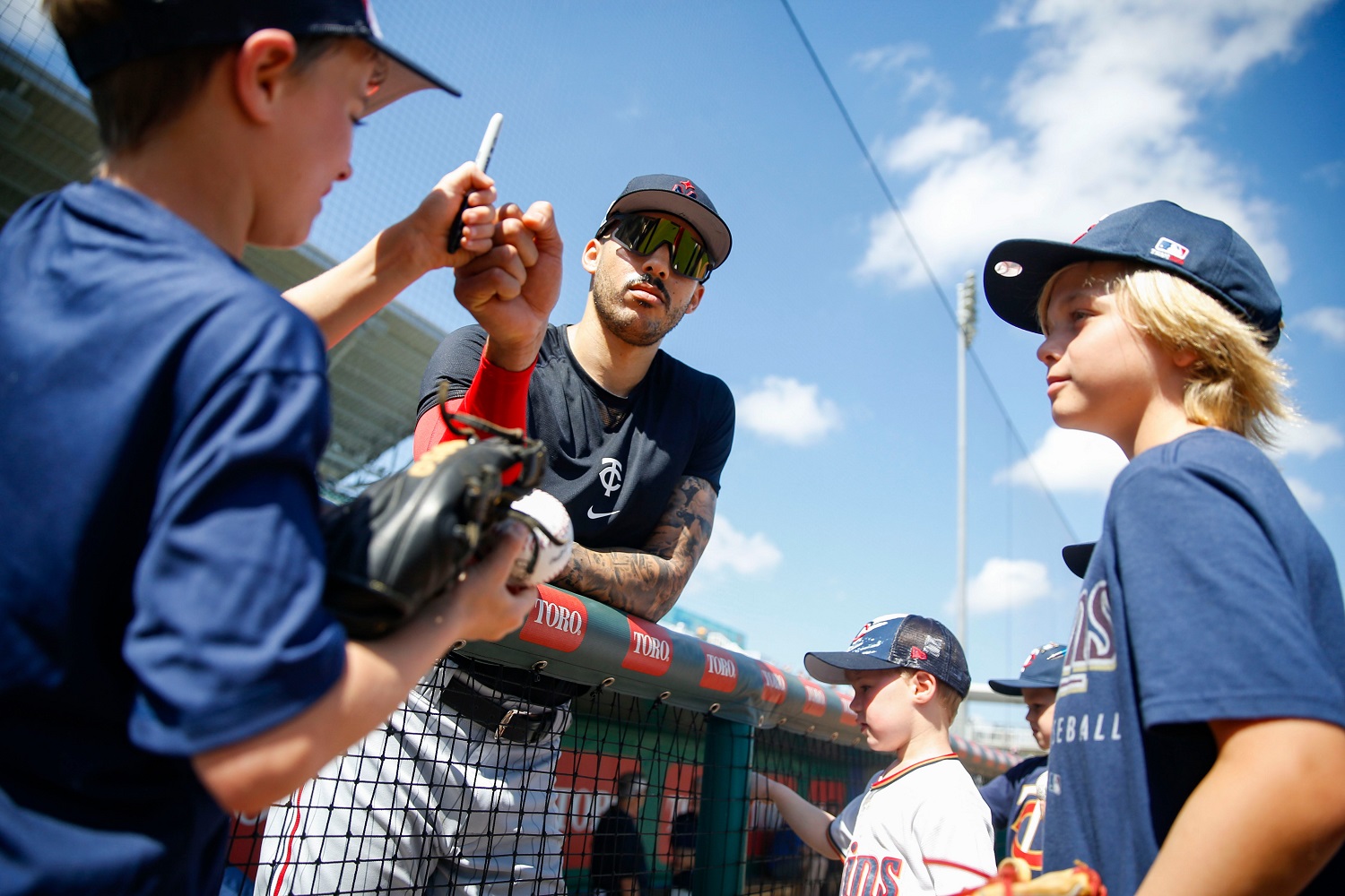 Photo: Twins Carlos Correa Hits a Pitch on Opening Day 2023