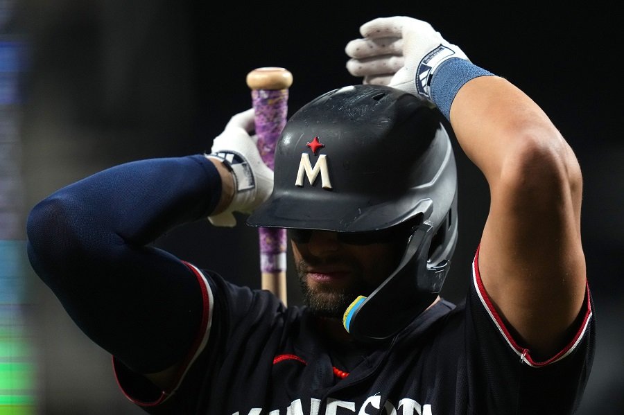 Why do players used to have a medic cross on their helmets? : r/baseball