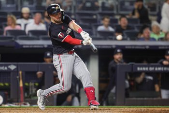 Twins' Kyle Farmer Turns to His 2021 Swing During Rehab Assignment, Aiming for Productive Return